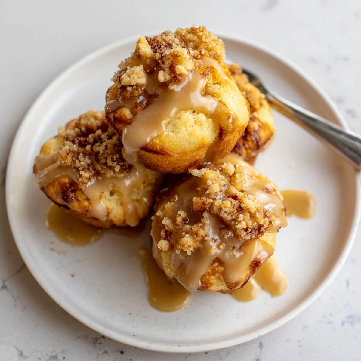 Tender, flavorful muffin bites infused with rich coffee and crunchy biscuit pieces.  