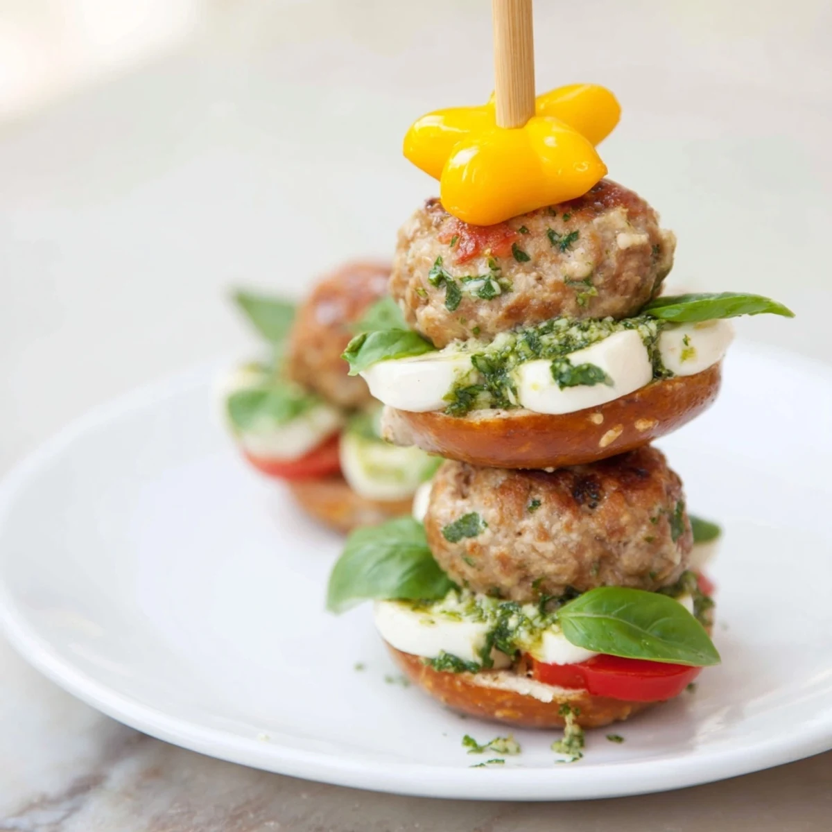 Bite-sized mini meatball Christmas trees arranged beautifully on a platter, ready to serve as appetizers.