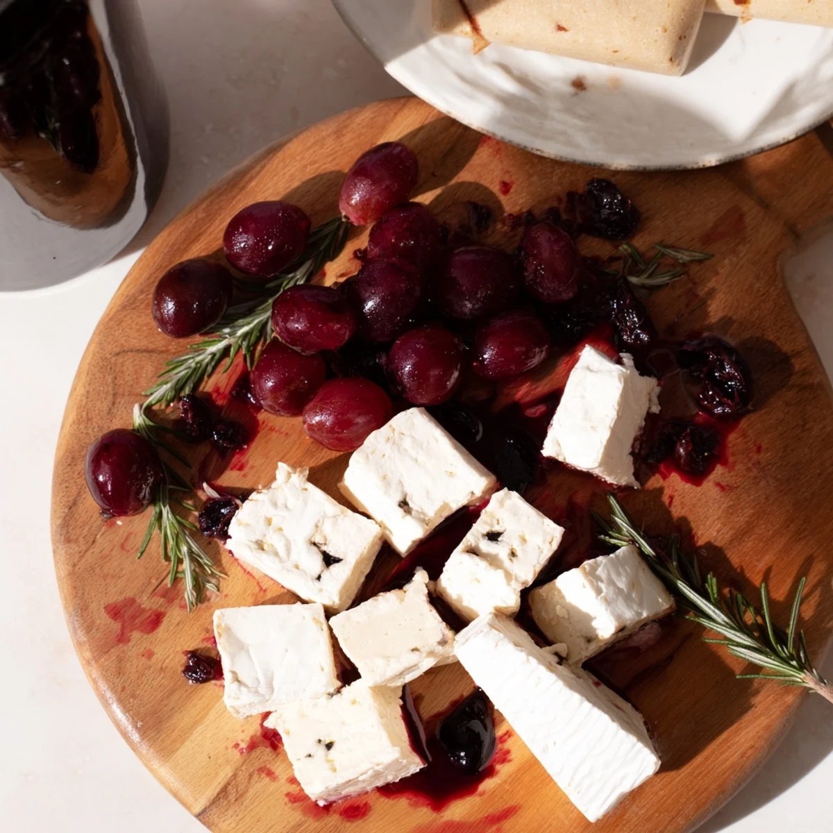 This stunning Ruby Red Wine Stain Board displays red cheeses next to red wine-soaked delicacies and crackers.