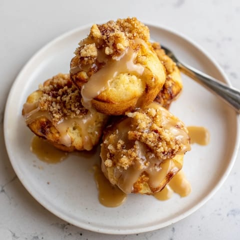 Tender, flavorful muffin bites infused with rich coffee and crunchy biscuit pieces.  
