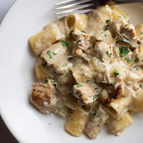 Delicious Creamy Garlic Parmesan Chicken Rigatoni served warm, perfect for cozy family dinners.  