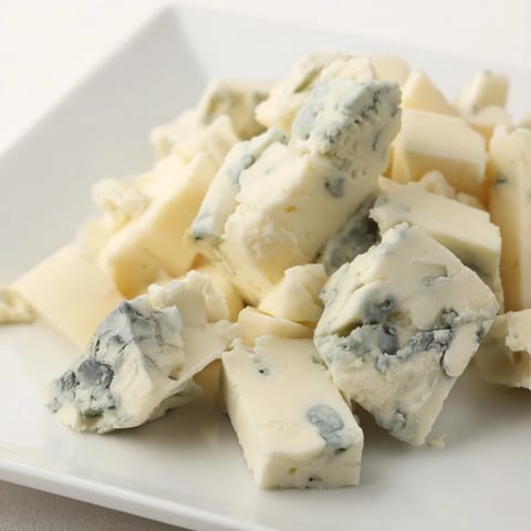 Irregular cuts of blue cheese and cheddar star in this "Marble Quarry," a stunning appetizer arrangement.