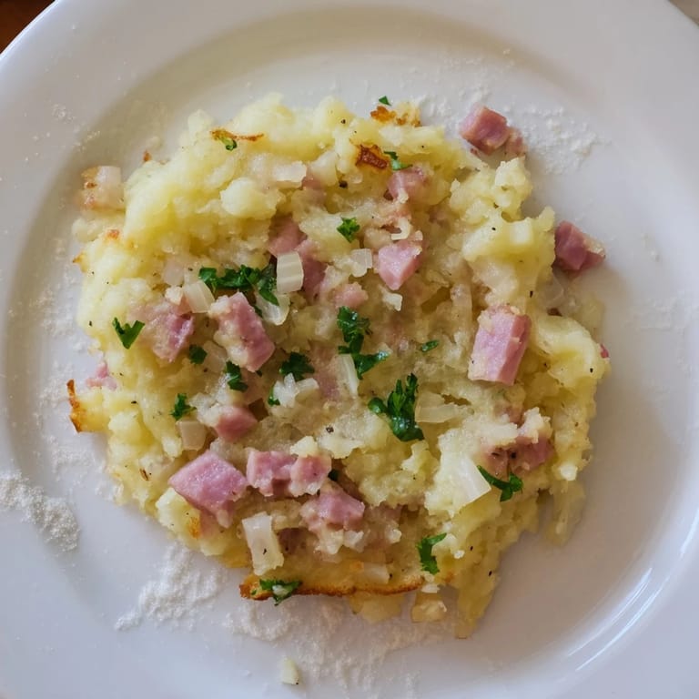 Close-up of crispy, pan-fried Ham & Potato Patties; a comforting Depression-era classic recipe.