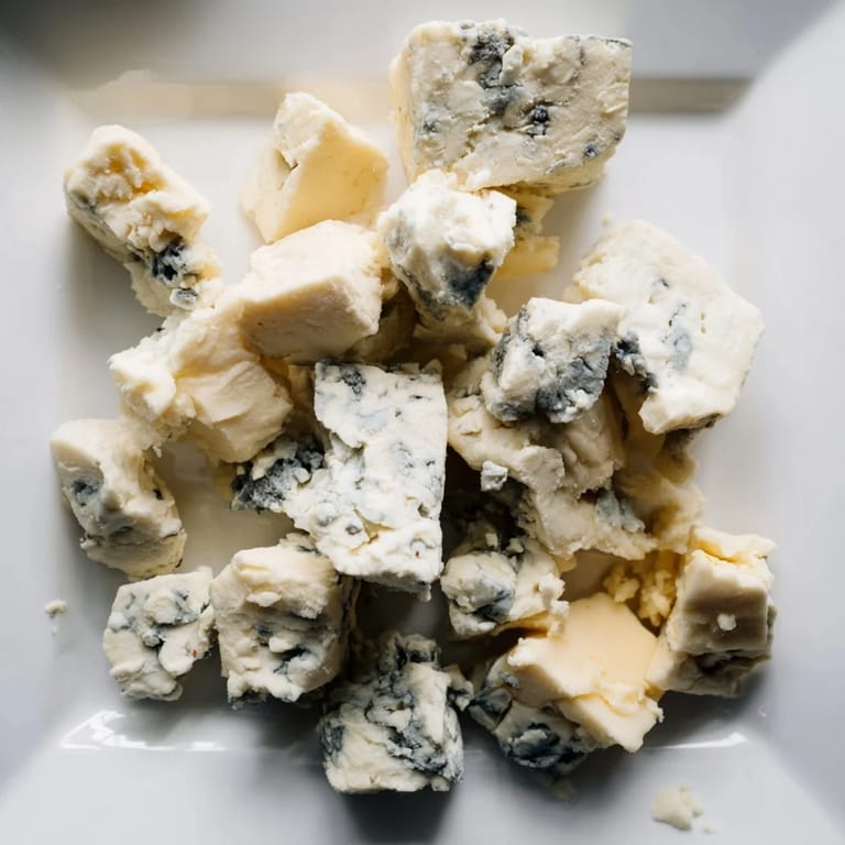 A tantalizing "Marble Quarry" cheese board, complete with blue cheese, ready for crackers and fruit.